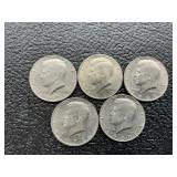 5 Kennedy half dollars