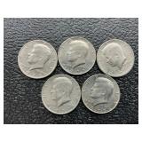 5 Kennedy half dollars