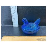 Hen on the nest has damage