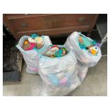 3 bags of stuffed toys
