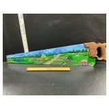 Painting on had saw
