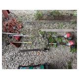 2 redmax trimmers with 1 attachment.