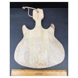 Wood guitar cutting board