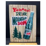 Mt. Dew embossed metal sign
