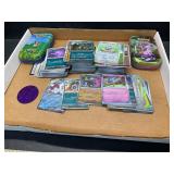 Pokï¿½mon Cards, 2 Tins, & Coin