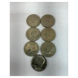7 Kennedy half dollars
