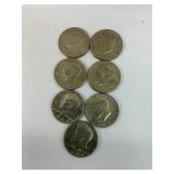 7 Kennedy half dollars