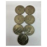 7 Kennedy half dollars