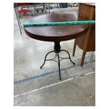 Table with iron base