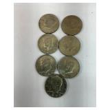 7 Kennedy half dollars