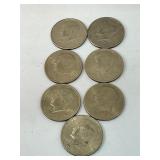 7 Kennedy half dollars