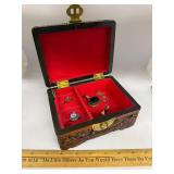 Carved wood box with sterling jewelry