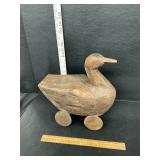 Wooden duck on wheels