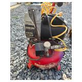 Air compressor with cover
