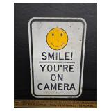 Smile Your On Camera heavy sign