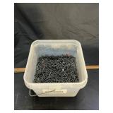 Bucket of screws