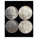 4 silver Kennedy half dollars