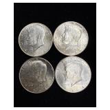 4 silver Kennedy half dollars