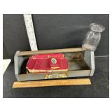 Tray with vintage milk bottle and rolling papers