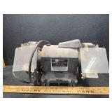 Bench grinder working