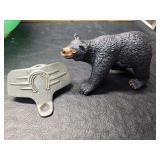 Bottle opener and a bear