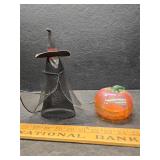 Witch and glass pumpkin