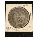 1884 O Morgan silver dollar