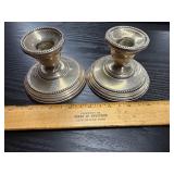 Sterling candle stands.  Weighted.