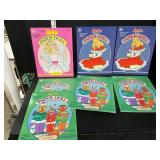 7 1980s unused paper doll books