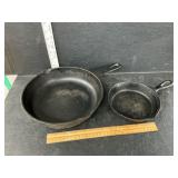 2 cast iron pans