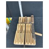 Block with vintage handmade knives