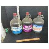 3 vintage syrup jugs