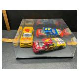 3 die cast cars