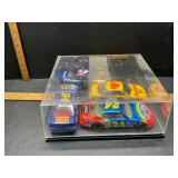 4 die cast cars