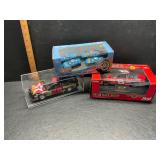 Die cast cars and a model