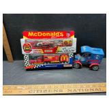 2 transporters and a Diecast bank