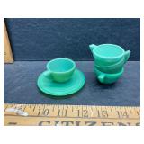 Vintage miniature tea cups and saucer