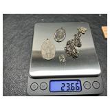 23.66 grams of sterling silver