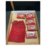Tobacco tins and vintage bank bag