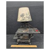 Crescent cast iron stove lamp