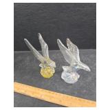 Glass eagles and a tile