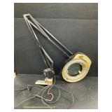 Light w Magnifying Glass