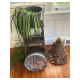 Ladder, tree, cheese box and living plant