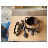 Bell and other cast iron pieces