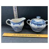 Blue and white cream and sugar