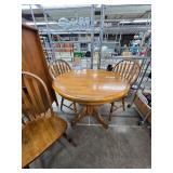 42 inch round solid oak table with 3 chairs