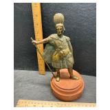 Brass on wood statue