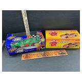 2 die cast race cars