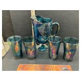 Carnival glass pitcher and 4 glasses