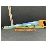 Painting on a hand saw